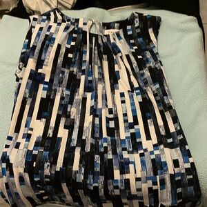 Calvin Klein office wear in blue, blk and white.  Small